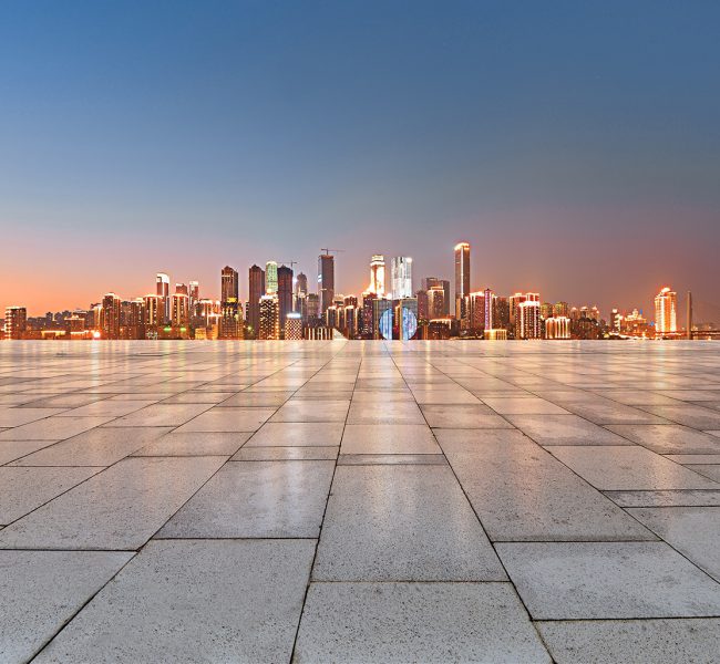 Empty floor with modern skyline and buildings